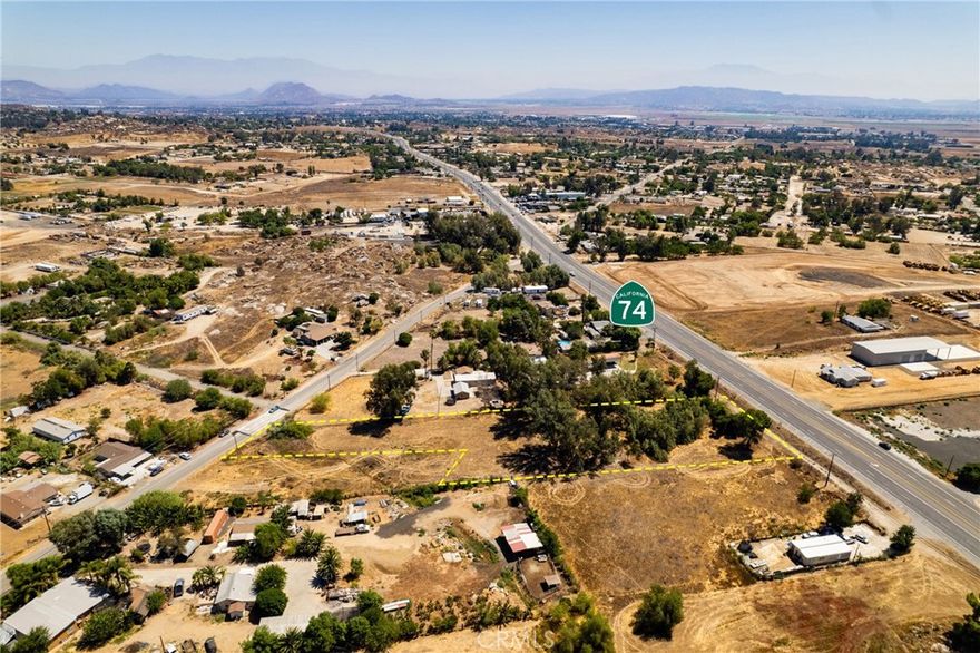 2 Beautiful flat parcels being sold together totalling 1.78 Acres with 165 feet frontage on Highway 74 and 85 feet frontage on Mountain! Zoned by the County for Business Park Commercial, but you can build a home, have a manufacture home or two, or build a business, or both! It is a very good investment PERIOD to hold or build. It is in the path of development, if you check with the county they are turning all Highway 74 in Perris Commercial, we are priced competitively! Our parcels are already Budiness Park Commercial, but homes or farms/ranches still allowed!