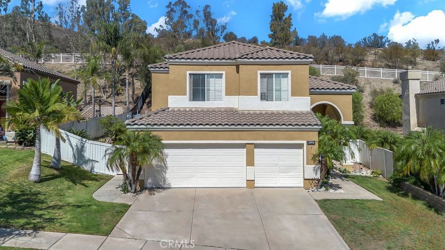 Welcome to 1096 Casandra Lane - Situated on a quiet residential street in the heart of Corona.  A well-maintained home featuring elegant laminate flooring, stylish ceramic tile, and plantation shutters.  Enjoy a spacious living area and on open concept layout perfect for entertaining.  The updated garage motor offers convenience and peace of mind, while the large indoor laundry room adds functionality.  A full bathroom downstairs provides added convenience for guests.  The highlight of the home is the grand, elegant staircase leading to the upper level.  Step outside to a generous backyard - ideal for entertaining, relaxing or creating your own outdoor oasis.  Located close to major shopping, restaurants and easy access to the 91 Freeway for a smooth commute.  Don't miss out on this fantastic opportunity!!