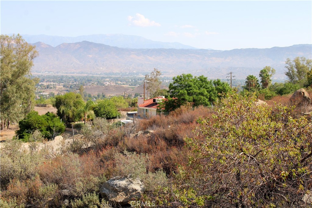 1.11 Acres with pad area in the Hills just above East Hemet. Desirable neighborhood of estate homes with great views of the Valley and Mountains. Great location with a rural feel yet just minutes outside the city. Zoning is R-1-1 and elevation is 2134 Feet. No HOA. Adjacent lots available for sale from same owner for anyone wanting a larger parcel in this area.