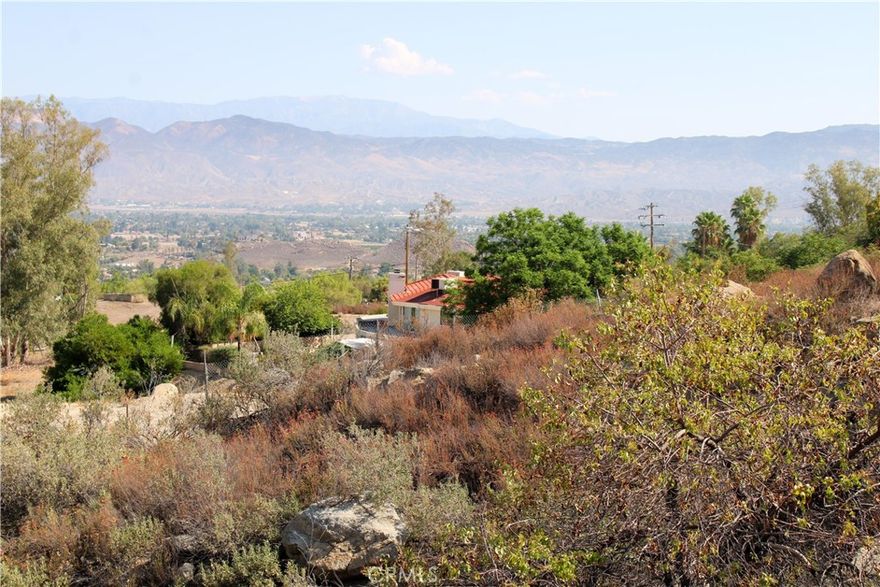 1.11 Acres with pad area in the Hills just above East Hemet. This lot has a water meter. Desirable neighborhood of estate homes with great views of the Valley and Mountains. Great location with a rural feel yet just minutes outside the city. Zoning is R-1-1 and elevation is 2134 Feet. No HOA. Adjacent lots available for sale from same owner for anyone wanting a larger parcel in this area. ***Property has an address sign out front that reads 28355 ***