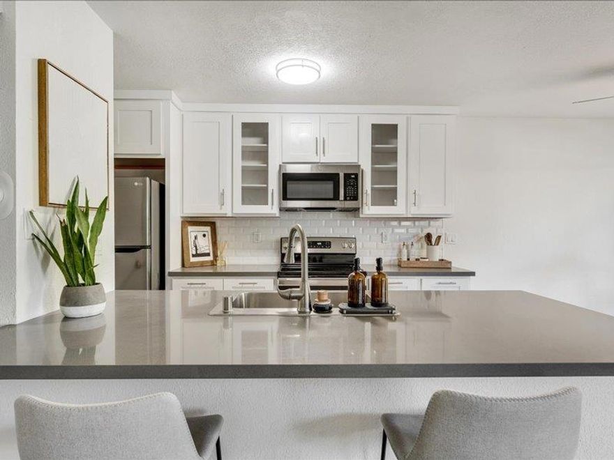 Turnkey living in Capitola! This beautifully updated condo shines with a newly remodeled kitchen and bath, new windows throughout, a new heater, luxury plank flooring, abundant natural light, and a fresh coastal-inspired palette. Designer touches include quartz counters, soft-close cabinetry, bar seating, and a pantry closet, perfect for cooking and entertaining. Upstairs, two serene bedrooms offer peaceful retreats after a day by the coast. Live the lifestyle where your car becomes optional, walk, bike, or surf your way through the day. Perfectly situated between Capitola Village and Pleasure Point, youre just steps from Jade Street Park, community sports courts, and minutes to The Hook, Verve Coffee, New Leaf, Whole Foods, or a sweet treat at Busy Bees Café. Enjoy covered parking with secure storage for boards, bikes, and beach gear, plus access to a sparkling pool, picnic area, and well-maintained grounds. Even better, a brand-new roof will be installed by November 2025. Whether as a primary home, vacation escape, or investment, this condo checks all the boxes. Welcome home to Capitola Shores!