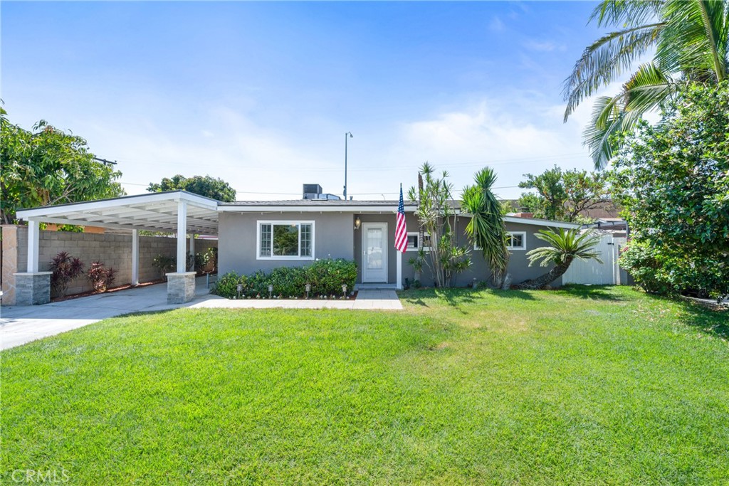 Get ready to fall in love—this fabulous one-story dream home is bursting with charm, style, and wow-factor upgrades!
Step inside this remodeled 4-bedroom beauty (one’s currently a dream closet!) and discover approximately 1,479 sq. ft. of stylish, single-level living designed for comfort and fun.
Whip up your favorite meals in the kitchen, complete with upgraded cabinets, sleek granite counters, and a layout perfect for everyday living and weekend entertaining. The open-concept floorplan flows seamlessly from the cozy living room with a stylish fireplace to the spacious family/dining area—hello, dinner parties and movie nights!
Designer paint, updated tile and laminate floors, crown molding, and recessed lighting throughout make every room pop. Both bathrooms? Fully remodeled and spa-like. And the oversized primary suite is your personal retreat, with peaceful views of your private backyard oasis.
Let’s talk backyard goals: dive into your sparkling private pool, tend to your garden, chill in the shade, or entertain under the stars—this backyard has it all. There's even a detached garage with a roll-up door and epoxy floors, a long driveway with a new carport, and plenty of space to play, party, or relax.
Tons of bonus features: newer A/C and ducting , pool pump, water heater, dual pane windows, new electrical panel and an automated sprinkler systemout front to keep things green and gorgeous.
It’s rare to find a home this upgraded and move-in ready at this price—so don’t blink or you might miss it. Your poolside paradise awaits.