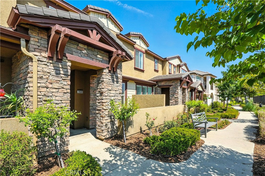 Absolute TURNKEY townhome in desirable Valencia West Creek! East facing front door and patio face out to the Santa Clarita River and bike path. Inside you'll find all new flooring and paint throughout. The downstairs floor plan is open with living room, dining room, and kitchen. Upstairs has a computer niche, stackable laundry (included), and 3 spacious bedrooms with tall ceilings. The primary bed/bath features a walk in closet and view to the east. Walk to West Creek park or HOA pool/spa, Rio Norte Jr High, or Havana Savannah! Close to shopping, restaurants, and all the conveniences you need! Many look to live in this area for the highly touted West Creek Academy elementary school, and this will put you right in the boundaries! Additional highlights include a convenient first-floor powder room, a two-car garage with custom storage cabinetry. The private east facing patio at the entry is perfect for BBQs, gardening, or entertaining guests. Situated in a prime location within the community, you'll have easy access to the resort-style amenities including a stunning clubhouse, large swimming pool, multiple parks, community BBQ areas, and extensive walking and biking trails.