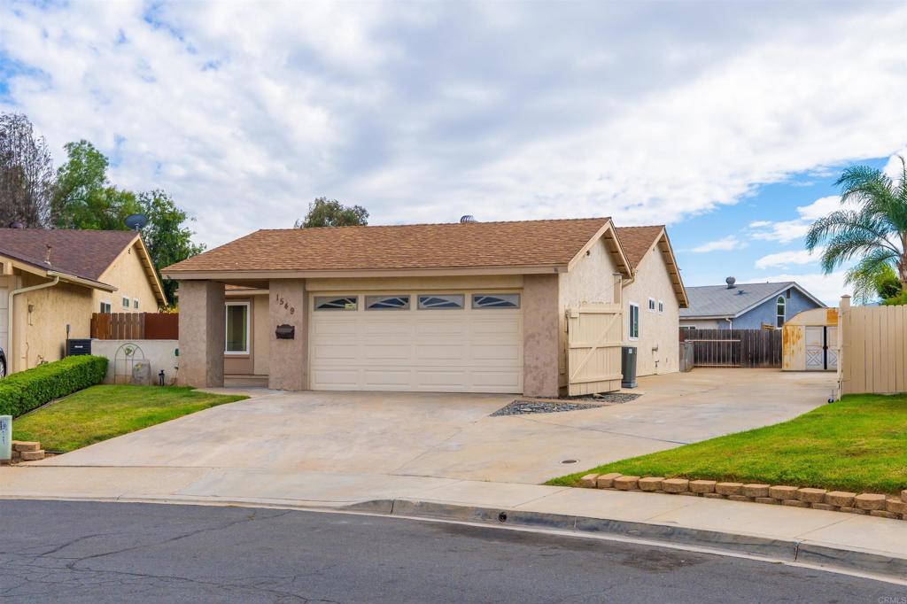Tucked away at the end of a peaceful cul-de-sac, this spacious 4-bedroom, 2-bathroom single-story home offers the perfect blend of comfort, functionality, and convenience. The low-maintenance, fully fenced lot features RV and boat parking—ideal for an active lifestyle. Relax and entertain under the expansive covered patio, while central A/C, forced air heating, dual pane windows, and ceiling fans ensure year-round comfort. A large 2-car garage provides added storage and flexibility. Recently refreshed with tasteful renovations, including brand-new flooring, an updated primary bathroom, and fresh paint, this home is move-in ready. Don’t miss your chance to enjoy these modern updates—schedule a showing today!