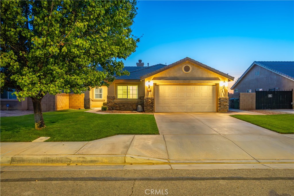 ***LIVE BEAUTIFULLY*** Excellent First Time Home Buyer Opportunity! Large Backyard. Built In 2005! Gorgeous Curb Appeal w/ Lush Green Grass. A Family Room w/ A Fireplace. Spacious Kitchen w/ Ample Counter Space, LED Lighting, And A Pantry. Primary Suite Is A Good Space And Offers A Primary Bath w/ Dual Vanities. Inside Laundry! Massive Backyard w/ A Covered Patio & Block Walls All Around! Centrally Located Close To Schools, High Desert Regional Health Center, And Parks, This Home Is A MUST See!