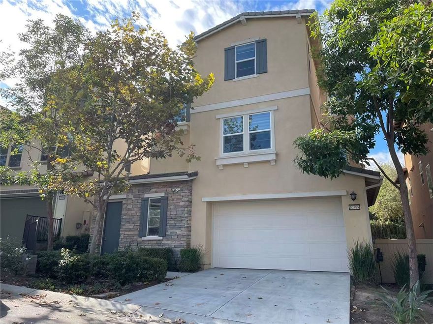 Experience luxury living in this stunning, tri-level home located in the prestigious, gated South Pointe community of Diamond Bar. Zoned for the highly acclaimed Walnut Valley Unified School District. This spacious residence offers modern design and is perfect for multi-generational families or tenants seeking privacy and style.

Step inside to an open and inviting layout. The main level features a beautiful kitchen with soft-close dark cabinetry, granite countertops, a large center island, and high-end Monogram stainless steel appliances. The kitchen opens seamlessly to a spacious great room, which extends into a covered California room — ideal for indoor-outdoor entertaining or relaxing. This level also includes a private bedroom suite, ideal for guests, extended family, or home office use.

The second floor features an expansive primary suite with a huge walk-in closet, private balcony, and a spa-inspired ensuite bathroom with dual sinks, elegant dark cabinetry, and separate wet/dry zones for ultimate functionality. Two spacious additional bedrooms on this floor share a convenient Jack-and-Jill bathroom, and the laundry room is also located on the second floor for added convenience.

The third floor offers a huge loft — perfect as a media room, game room, or secondary living space — which opens onto a large balcony, providing an ideal space for outdoor relaxation or entertaining. This level also includes another private bedroom suite, providing additional comfort and flexibility for extended family and guests.

The backyard is designed for easy maintenance, with artificial grass and a tranquil waterfall spillway fountain, creating a peaceful outdoor escape. Additional practical features include a 2-car garage with a decent-sized storage room inside, providing ample space for vehicles and extra belongings.**Leased solar panels for energy efficiency **Gated community living with enhanced security **Top-rated schools: Diamond Bar High School, South Point Middle School, Walnut Elementary School **Larkstone Park **Easy freeway access **Nearby shopping and dining. A true must-see—this one won’t last!