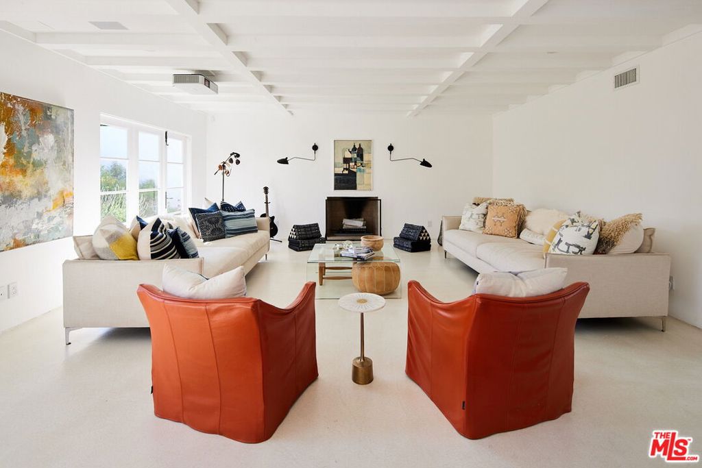 Perched above Castle Rock Beach in Sunset Mesa, this exquisite Malibu retreat offers the ultimate summer escape. Fully furnished and impeccably decorated by a professional, the home features mid-century collectibles, fine rugs, stunning paintings, and elegant furnishings.Designed with post-and-beam architecture, it boasts Viking professional appliances, Kohler and Dornbracht fixtures, and expansive Fleetwood windows and doors. Three bedrooms, three bathrooms, and a spacious open-concept family and dining area provide ideal space for relaxing and entertaining.Outside, a sparkling pool is surrounded by lush landscaping, with intimate spots to unwind, read, or tend the vegetable garden. The private courtyard and Provence-style grounds, featuring olive trees, Turkish fig, lemons, NZ finger-lime, and mulberries, create a serene oasis.Conveniently located near shopping, restaurants, and the Getty Villa Museum, you can stroll for dinner, entertainment, or simply to enjoy the waves. This Malibu retreat perfectly blends luxury, comfort, and the coastal lifestyle.For details and availability, please contact the listing agent.