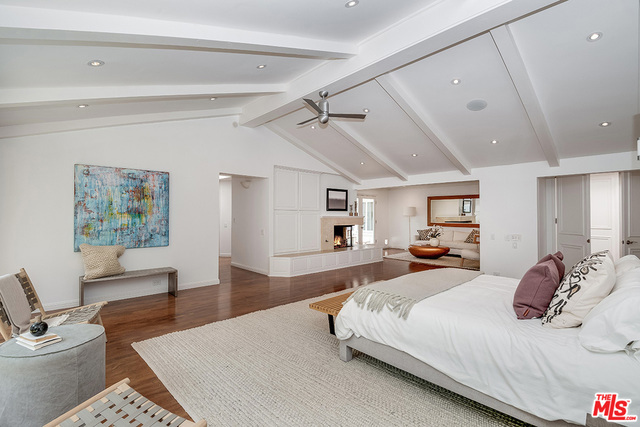 An abundance of natural light fills this recently remodeled 5 bedroom/ 7 bathroom contemporary home located within the exclusive guard - gated community, The Summit. With stunning city views that span the entire valley, the home features vaulted ceilings, a chef's kitchen complete with Viking and Sub Zero appliances and the added luxury of en-suite bathrooms in every bedroom. An entertainers paradise awaits in the backyard, with a sparkling pool, built in sports bar, BBQ and bocce ball court.