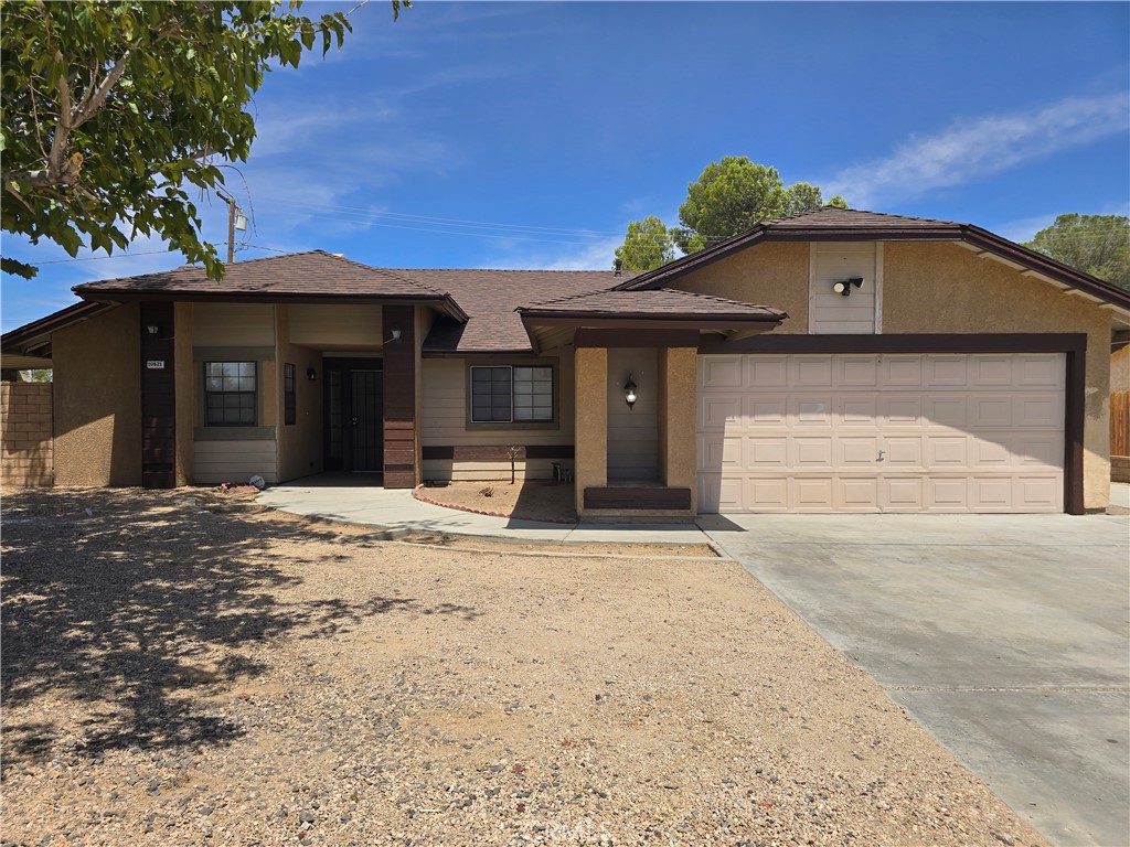 Beautiful 3 bedroom and 2 bathroom house. Lots of parking and large backyard. The primary bedroom has a large walk in closet. High ceilings, fire place and brand new vinyl flooring. Freshly painted. Patio off the kitchen. Laundry room inside the house.