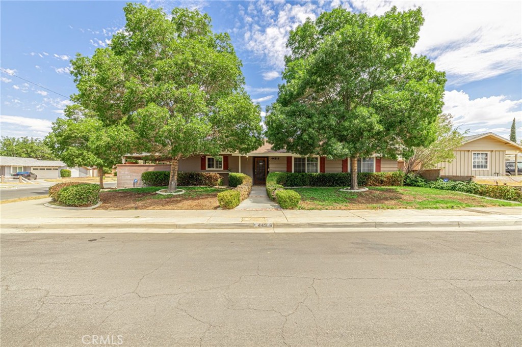 Make time to see this large updated 3 bed 2 bath 1,894 sq ft corner home on a cul-de-sac just north of the Lancaster Blvd block of churches. Talk about private and serene, this West Lancaster beauty is also next to a dead-end street. The home's other highlights include: 1) Plentiful, rich kitchen cabinetry along with a microwave and double oven, 2) Primary bedroom suite has a bathroom with an updated tile shower and both baths have a wall heater, 3) Office room with tons of cabinetry and the laundry area, 4) Three bedrooms with ceiling fans, 5) Huge family room to go along with a living/dining combo with fireplace, 6) Ceilings are all textured, all the carpet and interior paint is in excellent condition and the HVAC system extends to the attached sunroom for year-round enjoyment, 7) The side covered patio has a brick oven and decorative lights, while the rear patio has a Zen feel with plenty of trees for privacy, 8) All this topped off a Google nest camera set, a doorbell camera and a large rear shed which has multiple shelves for your storage needs. Don't miss out on this lovely home.