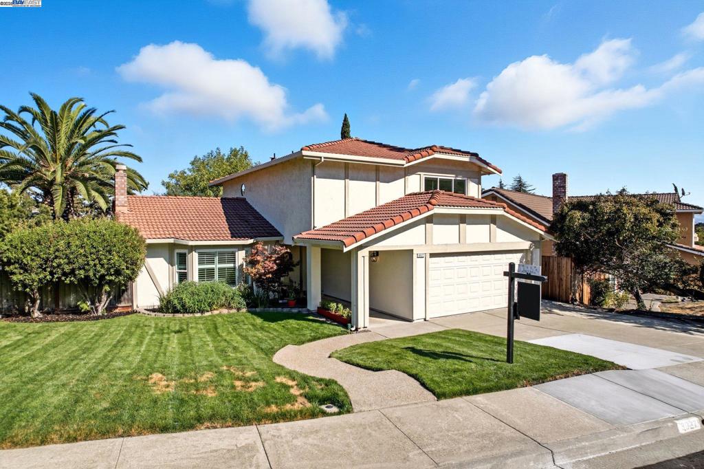 Welcome to a refined living experience. This elegant, renovated 4 bed 2.5 bath home boasts 2,168 square feet of craftsmanship and modern convenience. As you enter, be greeted by new LVP flooring and new plush carpet underfoot, complemented by fresh paint, baseboards and lighting throughout. The heart of this home is its open concept kitchen, showcasing new quartz countertops, a sleek backsplash, and stainless-steel appliances. Relish cozy evenings by the wood-burning fireplace in the inviting living room and enjoy gathering with friends and family in the expansive dining room. Retreat to the large primary ensuite bedroom with views of the hills. Each bathroom is thoughtfully updated with contemporary vanities and modern lighting. Easily convert the dining room to a fifth bedroom if you need first floor sleeping. The generous lot has beautifully landscaped front and back yards with lush new grass and vibrant plantings. Enhanced with a new forced air furnace and central air conditioning, this home epitomizes elegance and comfort in perfect harmony. This home is in the sought-after Silvergate neighborhood and is zoned for three highly rated Dublin public schools.