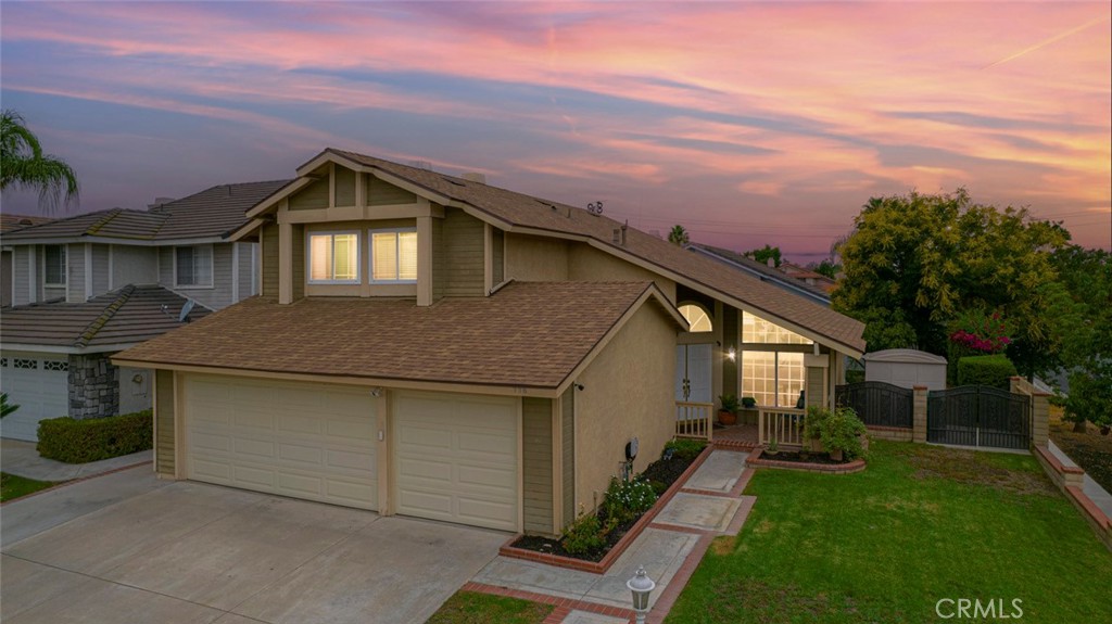 Welcome to 998 Colby Circle — a spacious four-bedroom, three-bathroom home on a corner lot in a quiet cul-de-sac. Walk through the double doors into a bright entryway with vaulted ceilings and great natural light. The living and dining areas are open and inviting, with updated flooring, plush carpet, and a cozy fireplace in the dining room. The kitchen has granite counters, updated cabinets, and stainless steel appliances, and it opens right into a large family room with access to the backyard.
Downstairs you’ll find one bedroom and a full bath, plus direct access to the three-car garage — which could be a great candidate for an ADU conversion. Upstairs are three more bedrooms, all with walk-in closets, and two full bathrooms. The primary suite is generously sized with its own walk-in closet, en suite bathroom, and direct access to a huge rooftop deck — perfect for morning coffee, sunbathing, or entertaining.
You can reach the backyard from the rooftop deck via a spiral staircase or through French doors in the family room. The yard features a covered patio, fig tree, storage shed, and a side area that may fit an RV or boat.
Other updates include paid-off solar, newer roof, HVAC, and a security camera system. It’s a great home with plenty of space, functionality, and outdoor living options.