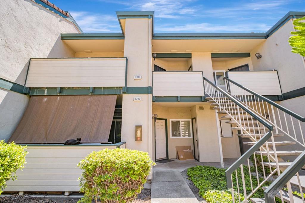 Welcome to your new home in a beautifully maintained gated community, just a short stroll to Union Landing restaurants, shopping, and entertainment! This top-floor 2-bedroom, 2-bathroom condo offers the perfect blend of comfort, style, and convenience. Step inside to discover vaulted ceilings that create a spacious, airy feel, complemented by newer luxury vinyl plank flooring, double pane windows, and recessed lighting throughout. The open-concept living and dining areas flow seamlessly, making entertaining a breeze. Enjoy the convenience of in-unit full-sized washer and dryer, plus two spacious bedrooms, including a primary suite with its own full bath and additional storage space above the closet. Gated, secure community with 2 parking spots and abundant day-time guest parking, Private balcony has views of a beautifully landscaped courtyard and is perfect for morning coffee or evening relaxation, Low maintenance living with access to community amenities: pool, spa, BBQ/picnic area, and basketball court. Low HOA fee includes water, sewer, garbage and common area maintenance. Close to BART, major freeways. a Property has been professionally cleaned since inspection, see sellers' comments on the report. Ring doorbell does not convey. Sellers will replace with a standard button.