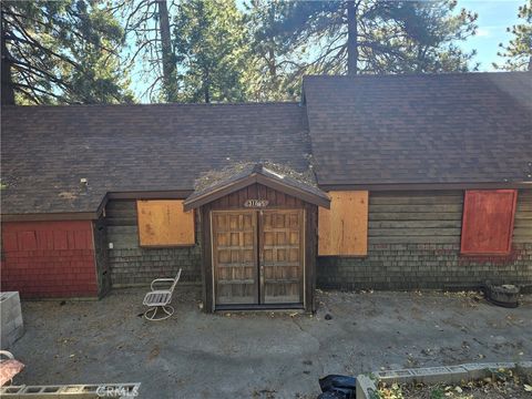 Photo of 31845 Hilltop Dr, Running Springs, CA 92382 (MLS # IG25277008)