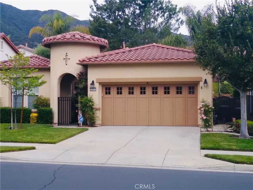 Welcome to 23931 Augusta Drive, a beautifully maintained single-story home located in the highly desirable 55+ gated community of Trilogy at Glen Ivy. This peaceful retreat offers resort-style living surrounded by the natural beauty of the Cleveland National Forest and the lush fairways of Glen Ivy Golf Course.



A gated front courtyard welcomes you into an open and inviting floorplan. The spacious kitchen overlooks the family room and features granite countertops, a large island, pantry storage, gas cooking, and a new dishwasher. The family room is warm and comfortable with a gas fireplace, perfect for relaxing or entertaining. A flexible bonus room off the entry can be used as an office, den, or formal dining area. Tile flooring runs through most of the home, and ceiling fans in the family room and bedrooms add to the comfort.



The primary bedroom is generously sized with a walk-in closet, walk-in shower, and linen storage. The guest bedroom is privately positioned at the front of the home, and the guest bathroom includes a shower over tub. Step outside to the back patio and enjoy a low-maintenance outdoor space with an Alumawood patio cover, turf lawn, and mature plants on drip irrigation—ideal for quiet mornings or entertaining friends. The HOA maintains the front yard, so you can truly enjoy a lock-and-leave lifestyle.



Additional upgrades include a newer HVAC system with a quiet outdoor condenser, ADT security system with cameras, built-in garage cabinets, overhead storage racks, newer garage door opener, pet door to the side yard, and an updated water heater with expansion tank and pressure regulator.



Living in Trilogy means access to exceptional amenities, including the Pacific Crest Lodge with social spaces, learning center and billiards room, and the Blue Water Sports Club with a state-of-the-art fitness center, indoor pool, and walking track. Residents also enjoy an outdoor pool, tennis and pickleball courts, golf, walking trails, and community events. Glen Ivy Hot Springs Spa, Glen Ivy Golf Club, shopping, dining, and more are just minutes away.



Experience the best of active adult living in one of Corona’s most loved communities—this is the perfect place to call home.