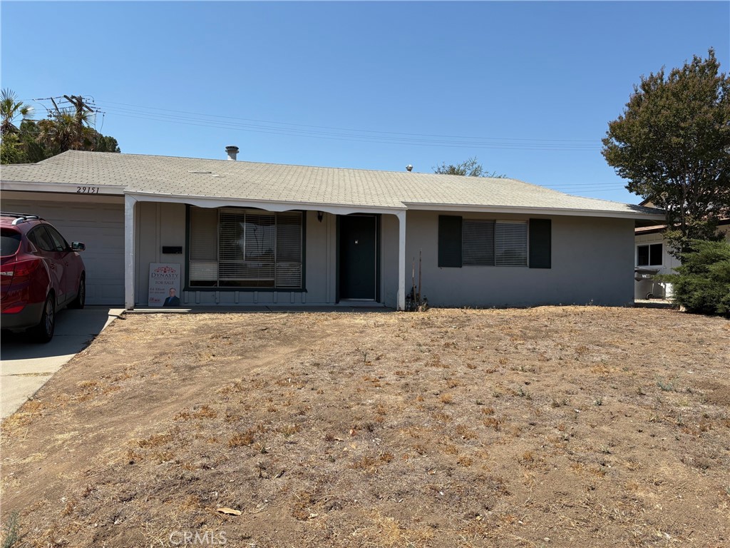 Located on a quiet street, this 2+2 home backs up to the association golf course in Sun City. 55+ restricted community. Large kitchen with white cabinets and tile countertops. Both the guest bath and primary bathroom have been remodeled. The home features laundry with a washer & dryer conveniently located just off the primary bathroom. Easy maintenance laminate floors run throughout the house. The one-car attached garage has a small workshop toward the back, and a side door leading to a secure fenced-in area perfect for use as a dog run. The Sun City Civic Association offers many activities and amenities. Swimming, bocce ball, sports courts, a fitness center, and the clubhouse are just a few of the benefits of this active community. Community features a low annual HOA fee