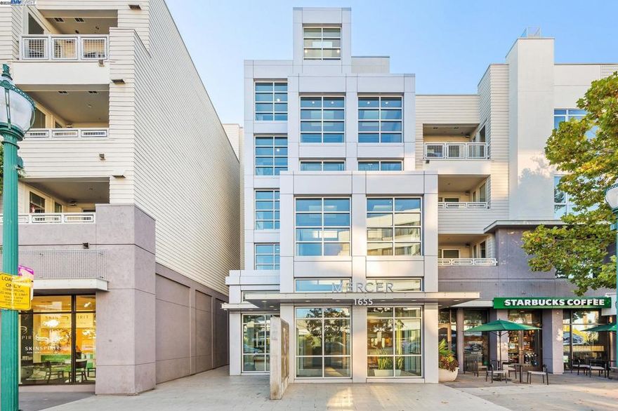 Luxury and convenience meet in this top-floor Mercer condo in the heart of downtown Walnut Creek. With 2 bedrooms and 2 baths across a spacious open layout, this home is filled with natural light through floor-to-ceiling windows and enhanced by higher ceilings exclusive to the 4th floor, modern flooring, and fresh paint. The gourmet kitchen features Sub-Zero and Bosch appliances, stone countertops, and a breakfast bar, flowing seamlessly into the dining and living areas. The primary suite offers a walk-in closet and a spa-inspired bathroom with double vanity, soaking tub, and separate shower. The second bedroom and full bath are ideal for guests, a home office, or both, while the laundry room with side-by-side washer/dryer and cabinetry adds everyday convenience.  Step outside to a covered patio overlooking the courtyard, or enjoy resort-style amenities including a pool, spa, gym, clubhouse, and BBQ area. Two side-by-side parking spaces and a storage unit complete the package. All of this just minutes from BART, freeway access, Broadway Plaza shopping, and Walnut Creek’s top dining and cultural destinations.  Photos were taken when the home was professionally staged and may not reflect the home’s current appearance.