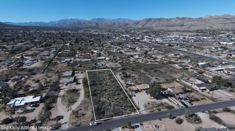 Photo of 7404 Lucerne, Yucca Valley, CA 92284 (MLS # JT26024275)