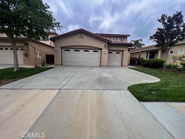 This beautiful two story residence sits gracefully on the Temeku Hills golf course within the charming Temeku Hills Community of Temecula! Boasting 4 bedrooms, all on the upper level, 2.5 bathrooms, and 2,590 sqft of living space, this home presents an inviting open floor plan with an attached 3 car garage. As you come inside, upgraded plank flooring, lofty ceilings, and a bright paint palette welcome you. The expansive entry leads seamlessly into the formal dining area. The kitchen is adorned with white cabinetry, tile countertops, a sizable island, and flows effortlessly into an additional dining space and the generous family room featuring a cozy fireplace. Through the sliding door off the dining area awaits the backyard oasis, complete with lush greenery, a covered patio, and panoramic views of the golf course, perfect for year-round enjoyment. A hallway off the family room leads to the laundry room with garage access, a convenient walk-in closet, and a half bath. Upstairs, a spacious landing connects all 4 bedrooms, bathrooms, and storage areas. The primary bedroom is a retreat in itself, offering plush carpeting, sweeping golf course vistas, and an ensuite featuring dual sinks, a vanity area, a large soaking tub, a separate shower, and an expansive walk-in closet. The remaining bedrooms are generously sized, adorned with carpet flooring and equipped with sliding door closets. The upstairs bathroom features dual sinks and a shower tub combination. Additionally, the 3 car garage boasts upgraded epoxy flooring. The community offers an array of resort-like amenities including golf, a heated pool, jacuzzi, a ballroom, fitness center, game room, social clubs, tot lot, sport courts (tennis, basketball, pickleball), a restaurant, and more! Conveniently located just minutes from Temecula Wine Country, PECHANGA Resort Casino, Old Town Temecula, The Promenade Mall, and the 15 freeway, this home offers the epitome of Southern California living!