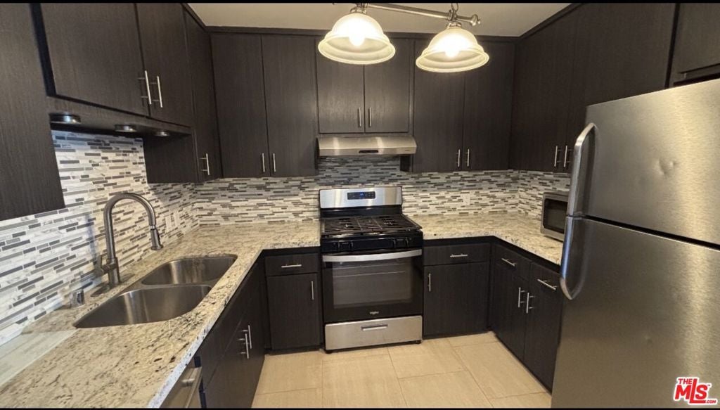 Photo of 12157 Moorpark Street #204, Studio City, CA 91604 (MLS # 26102312)