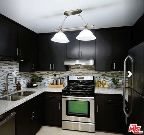 Photo of 12157 Moorpark Street #204, Studio City, CA 91604 (MLS # 26102312)