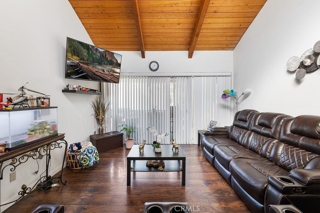 Welcome to this charming 2-bedroom, 1-bathroom condo offering 829 sq. ft. of comfortable living in the heart of Canoga Park. The home features a light-filled living room with striking wood beam ceilings, creating warmth and character. The layout includes a spacious primary suite, complemented by central A/C and heating for year-round comfort. The community offers fantastic amenities including a sparkling pool, relaxing jacuzzi, recreation room, and convenient on-site laundry facilities. Ideally located just minutes from the Topanga Mall, The Village, Costco and plenty of dining and entertainment options, this home offers the perfect blend of comfort and convenience at an incredible value.