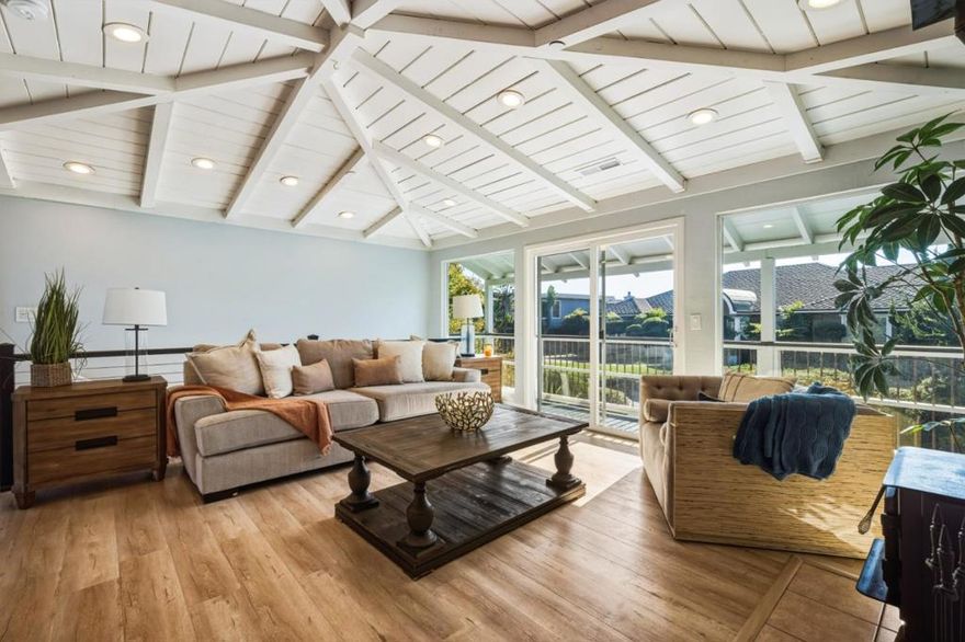 Welcome to 17 Sunset Drive, a stunning coastal retreat in the exclusive Sunset Beach community. Situated on a nearly 7,000 sqft lot, this beautiful home offers partial ocean and serene farm field views from almost every rooma perfect blend of tranquility and seaside living.  Spanning nearly 3,000 sqft, the residence features 4 bedrooms and 4 bathrooms across two distinct living spaces, offering exceptional flexibility. The property can serve as a spacious single-family home or be enjoyed as separate upper and lower living quarters.  The upstairs level boasts three bedrooms, two bathrooms, and two expansive decks ideal for taking in the coastal air. A brand-new kitchen with quartz countertops, modern appliances, and a pantry opens to a bright living roomthe perfect gathering space for family and friends.  The lower in-law suite includes a bedroom, office, and two bathrooms, complete with a wet bar/kitchenette, sprawling deck, and its own laundry room for added independence.  Additional highlights include ample parking with a tandem carport and three additional spaces, two separate laundry rooms,  high ceilings, and open-beam details that enhance the homes bright, airy feel. A wood stove adds cozy warmth on cool evenings.