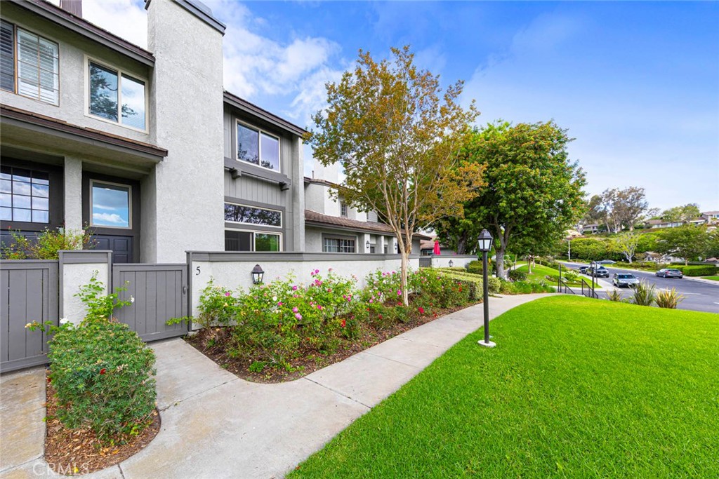 Welcome to 5 Stardust ~ a beautifully remodeled home perfectly situated on the greenbelt with direct views of the sparkling community pool, spa, and open natural space. Enjoy views of mature trees, & birdsong right outside your window, plus immediate access to walking paths and nature trails. Inside, nearly every detail has been upgraded: NEW paint, window coverings, LED lighting with dimmers, and smooth ceilings throughout. The bright kitchen features an extended countertop for added workspace, while the living room showcases a cozy fireplace and direct access to a private balcony with relaxing views. The bathroom includes an updated shower door and fixtures, and the home is fitted with NEW double-paned, energy-efficient windows and sliding doors that provide comfort, natural light, and sound reduction.
Smart storage solutions include wardrobe closets with organizers. Laundry area features a wash tub next to your washer and dryer.
The community offers resort-style amenities with tennis and volleyball courts, children’s playground, community and nature centers, plus access to hiking and biking trails just across from Sunny Hill Park. Highly rated schools and nearby colleges add to the appeal, making this home a wonderful choice for both lifestyle and convenience.**Don’t miss the chance to lease this move-in ready property in a desirable, well-maintained neighborhood.