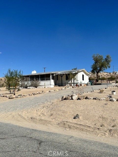 Photo of 6597 Mesquite Springs, 29 Palms, CA 92277 (MLS # OC25279448)