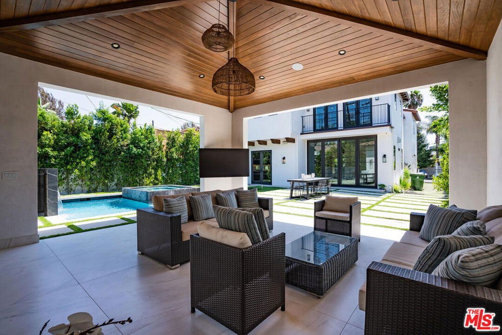 FULLY FURNISHED & EQUIPPED, AVAILABLE FOR SHORT AND LONG TERM RENTAL. Enjoy a prime WEHO location in this stylish gated new-construction. Exuding modern luxury, large windows throughout home provide natural light. Relax the private theater w/ surround sound system, a gourmet chef's kitchen and 3 spacious living rooms. Rest in master bedroom w/ stand-alone tub or 3 other grand bedrooms. Resort-like outdoor w/ covered patio, outdoor furniture & dining, new pool & spa. Close to W 3rd St, Cedars-Sinai Hospital & the Grove. Great for families & business travelers.