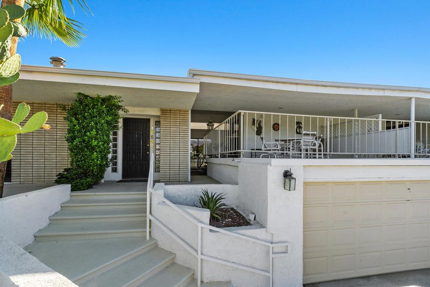 This home has a distinct 1970s vibe, offering a time capsule experience for those seeking a unique living environment. Superb location with golf course views from front and rear of property. Reimagine it or renovate, the choice is yours! Approximately 2,028 square feet, this three-bedroom, three-bathroom condominium features a spacious exterior and lush landscaping, creating an inviting entryway. The open layout allows for ample natural light, showcasing the scenic outdoor views from the property. The spacious kitchen boasts granite countertops, and the exposed brick walls throughout add a unique and charming touch. The primary bedroom and additional bedrooms provide ample space, with each room offering bright lighting and ceiling fans. The bathrooms feature generous counter space and abundant natural light, ensuring comfort and functionality.The home's spacious outdoor area is well-maintained, with an inviting back patio perfect for relaxation just steps from the shared pool. Also equipped with built in BBQ and your very own drive up golf cart garage.
