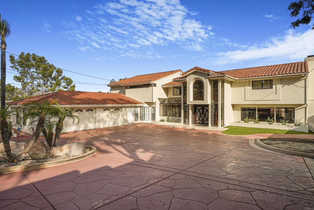 Welcome to 5274 Margaret St, a one-of-a-kind luxury estate in the heart of Bonita, offering nearly 6,000 sq. ft. of living space at under $400 per square foot — a rare opportunity to own a property of this caliber in San Diego County priced well below replacement cost.  Privately set behind gates at the end of a cul-de-sac, this fully furnished residence combines resort-style amenities, modern upgrades, and timeless elegance. With 5 bedrooms, 8 bathrooms, a detached ADU, 3-car garage, and a massive gated driveway, this property was designed for both everyday comfort and grand entertaining.  Step inside to an open-concept layout filled with natural light. The chef’s kitchen features stainless steel appliances, stone counters, and direct flow into the formal dining room, multiple living areas, and a game/cigar lounge with full bar. A second family room with its own bar makes hosting effortless. The primary suite is a true retreat, offering a private deck, spa-inspired bath, oversized soaking tub, and a brand-new custom sauna. Upstairs, ensuite bedrooms feature walk-in closets and private balconies for family or guests.  Recent upgrades include: New flooring throughout Fresh interior & exterior paint New hardware & appliances Dual-zone A/C upgrades Large paid-off solar system Water heater upgrades Whole-home speaker system  The backyard is your private oasis with a heated pool and water slide, oversized jacuzzi, outdoor sound system, and lush mature landscaping — perfect for both lively pool parties and quiet evenings under the stars. The detached ADU offers a living room, kitchenette, bedroom, and full bath, ideal for extended family, guests, or rental income.  With its combination of luxury features, extensive upgrades, and unbeatable value per square foot, 5274 Margaret St is a truly exceptional offering. Minutes from shopping, dining, golf, hiking, and horse trails, this estate blends privacy, convenience, and world-class living in one.
