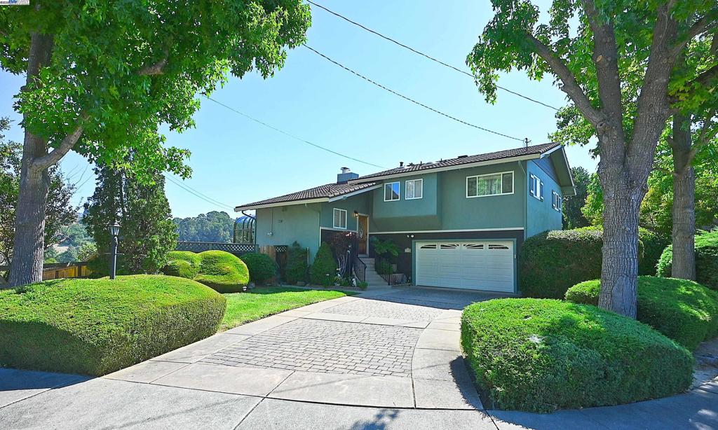 The debate is what you will like more, the fabulous location or the amazing features of 5295 Winifred Drive!! Tucked at the end of Winifred with no neighbors to the left and backing to Cull Canyon Regional Recreation Area is an oasis to call home. Open concept main level features magnificent kitchen with stainless steel appliances, granite slab counters & backsplash, 7 ft x 4 ft island with seating & ample cabinetry. Sunroom dining area just off the kitchen with beautiful views of Cull Canyon. Living area with those same views also features gas fireplace with decorative stone and double slider access to rear deck area. Upper level has the primary suite with double closets & en-suite with shower over jetted tub. Two bedrooms with mirrored closet doors. Hall bath with spa-like shower. Street level features full bath, laundry area with washer/dryer included & access door for interior access from garage plus another access door to side yard area. Lower level with two spacious bedrooms, both with exterior access doors offers potential for an ADU. Tranquil yard with multiple sitting areas, gazebo, terraced landscape beds & waterfall fountain feature. Soak in the views from the upper deck area that features retractable shade awning. OH Sat 6th & Sun 7th 1-4