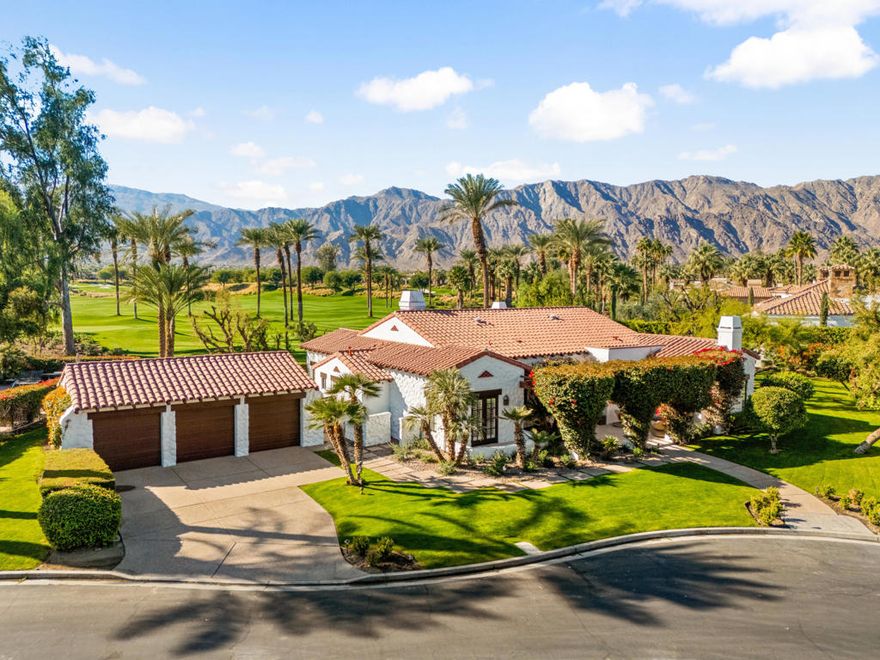 A rare opportunity to own a piece of golf history at Tradition Golf Club -- the former West Coast retreat of legendary Arnold Palmer. Custom built in 1999 specifically for Mr. Palmer, this exceptional four-bedroom residence occupies one of the community's most coveted locations, hand-selected by ''The King'' for its close proximity to the clubhouse and its spectacular southern mountain and fairway views. Thoughtfully reimagined with a warm, contemporary sensibility, the home blends timeless hacienda architecture with today's modern comforts. Inside, the great room showcases 16-foot wood-beam ceilings, heated Arto Saltillo tile flooring, and expansive Fleetwood sliders framing the panoramic views. The remodeled kitchen features DeWils cabinetry, Caesarstone counters, and Fisher & Paykel appliances, while the re-designed primary suite -- once Mr. Palmer's personal office -- now offers a tranquil retreat with a limestone-clad bath and custom built-ins. An additional three bedrooms (two en-suite) open to patios surrounded by mature landscaping, and the extended rear terrace provides multiple areas for lounging and dining amid the breathtaking desert backdrop. Sold designer-furnished per inventory, this remarkable residence remains a lasting reflection of Mr. Palmer's celebrated legacy and love for the game.