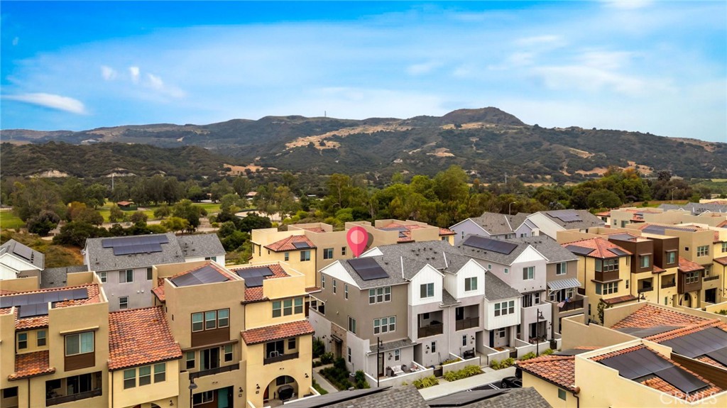 142 Juniper is a tri-level townhome that brings elevated design, everyday functionality, and a touch of luxe to the heart of Rancho Mission Viejo. Thoughtfully laid out and flooded with natural light, this home feels equal parts retreat and refined.
2 Beds | 2.5 Baths | Loft | 1,490 Sq Ft | 2-Car Garage
On the first level, a private en-suite bedroom opens to its own patio—perfect for guests, a stylish office, or your morning matcha moment. The second floor serves as the main gathering space, with wide plank luxury vinyl flooring, modern window treatments, and an open-concept layout ideal for entertaining. The kitchen features sleek cabinetry, stainless steel appliances, quartz counters, and a private balcony perfect for evening wind-downs.
The third level is all yours—an expansive primary suite with a spa-like bath, dual vanities, a generous walk-in closet, and a flexible loft nearby that can adapt to your lifestyle.
Other highlights: 2-car side-by-side garage, paid solar, and designer finishes throughout.
Located in the highly coveted Oasis enclave, you’ll enjoy access to all of Rancho Mission Viejo’s award-winning amenities—resort-style pools, fitness centers, hiking trails, community farms, and so much more.