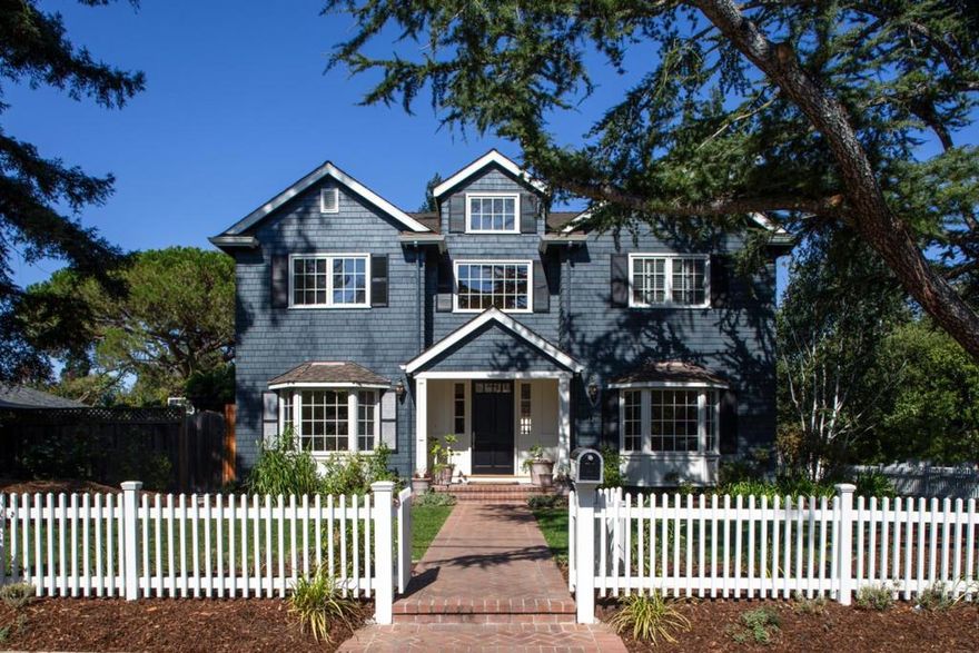 Impressive Hamptons-style home in the heart of West Menlo Park with timeless elegance on a fenced corner lot of more than one-quarter acre. Hardwood floors, classic crown moldings, and California window shutters in some rooms. Formal living and dining rooms, expansive kitchen, casual dining area with wine bar, and inviting family room. Dedicated office plus 4 upstairs bedrooms including primary suite and second suite ideal for guests. Picturesque outdoor oasis features a wisteria-covered barbecue center, stone fireplace, lawn, and raised bed for vegetables.  EV charging as well.  Outstanding location close to excellent Menlo Park elementary and middle schools as well as Stanford, venture capital centers, plus shops and restaurants on the Alameda and in downtown Menlo Park.