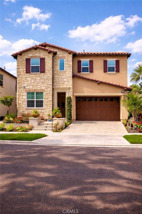 Photo of 328 Pinnacle Drive, Lake Forest, CA 92630 (MLS # OC26111034)