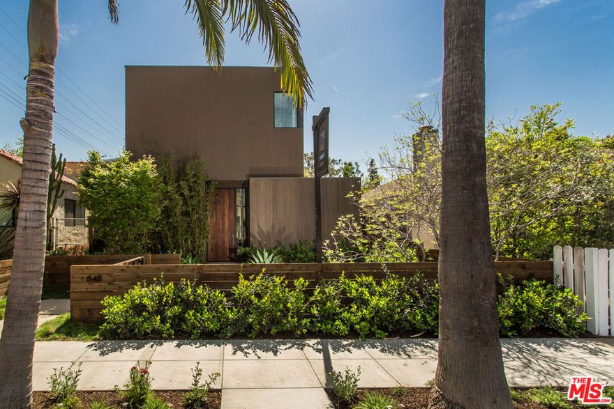 Stunning Marmol Radziner-Designed Modern on highly coveted Milwood Ave! Experience refined Venice living in this architecturally striking home. Bathed in natural light, the main level boasts soaring 10-foot ceilings and seamless indoor-outdoor living, courtesy of expansive sliding glass doors that open to a lush, private yard complete with a built-in BBQ and fire pit  an entertainer's dream.Crafted with the finest materials, this dramatic and spacious residence offers elevated design and functionality throughout. The state-of-the-art chef's kitchen features top-of-the-line Miele & subzero appliances, an oversized walk-in pantry with a wine fridge, abundant walnut cabinetry, and a large breakfast bar ideal for casual dining or hosting guests.Upstairs, a versatile flex space serves as a perfect office or play area. The breathtaking primary suite includes dual walk-in closets and a spa-inspired bath. Two additional generously sized bedrooms each feature en-suite baths, and a convenient walk-in laundry room adds to the thoughtful layout.Additional highlights include a cutting-edge security system, a two-car garage with an EV charging station, and two additional parking spots, offering rare off-street parking for four vehicles in total. This exquisite home blends luxury, design, and location  offering a rare opportunity to enjoy Venice living at its very best.