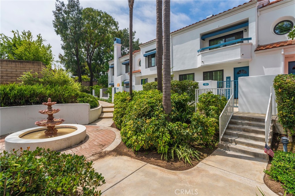 Welcome to 19561 Pompano Lane #104, a beautifully upgraded home in the highly desirable, guard-gated community of Pacific Ranch in Huntington Beach. Offering 4 spacious bedrooms, 2.5 bathrooms, and over 2,150 sq. ft. of comfortable living space with central A/C, this residence combines modern updates with coastal charm.
Step inside to find a completely remodeled kitchen with sleek stainless steel appliances, along with tastefully updated bathrooms and upgraded flooring throughout. Plantation wood shutters, abundant natural light, and a cozy fireplace in the family room create an inviting atmosphere. The private outdoor patio off the kitchen extends your living space—perfect for entertaining or relaxing. Additional highlights include an attached 2-car garage with a built-in Tesla charger, convenient inside laundry, and thoughtful finishes throughout.
Pacific Ranch is known for its resort-style amenities including pools, spas, and clubhouse facilities, all within a beautifully maintained, gated setting. Enjoy the unbeatable location—close to shopping, schools, and just a short bike ride to the beach, Main Street, Pacific City, and the Huntington Beach Pier with its incredible dining and entertainment.
This home is move-in ready and offers the best of the Huntington Beach lifestyle.