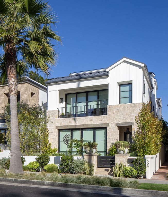 Stunning fully furnished luxury lease featuring a 2 bedroom, 2.5 bathroom residence ideally situated in close proximity to local beaches and countless amenities along PCH. Newly built in 2021, this home features a host of custom finishes: wide plank hardwood flooring, Rocky Mountain hardware, Bertazzoni range, and abundant use of natural stone counters. The open and expansive floor plan affords a large living room with vaulted ceilings adjacent the private loggia with welcoming fireplace. A beautifully designed powder bath services all common areas. A main floor primary bedroom with walk-in closet designed by California Closets, is complimented by the spa-inspired bathroom including dual vanities, oversized shower and water closet. Upstairs are a generous secondary bedroom with two beds and a full bathroom. The exceptional rooftop deck included covered dining area with fireplace, built-in BBQ station with sink, open deck for seating or tanning, and a rare rooftop office. Corona del Mar is Orange County's premier coastal community affording access to local beaches, CdM Plaza, Fashion Island and other local shops, restaurants & amenities within minutes of this residence.