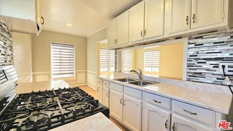 Photo of 1022 S Norton Avenue #C, Los Angeles, CA 90019 (MLS # 25565841)