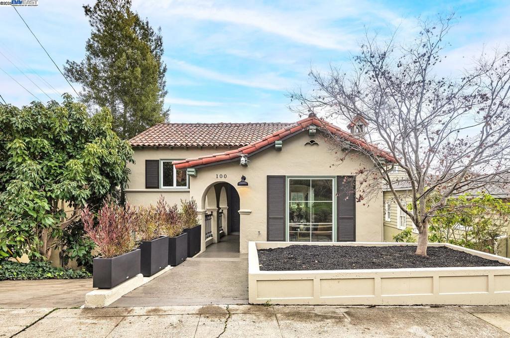 Price Reduction! Beautifully remodeled 5 bedroom, 3 bathroom, 2741sf home with attached two-car garage in the highly sought-after neighborhood of Upper Rockridge. Designer touches include a Spanish inspired interior, inviting archways, newly refinished oak hardwood and porcelain tile floors, limestone tiling, a TOTO smart bidet, Google NEST Smart thermostat and smoke/carbon monoxide alarms, all LED lighting, Milgard windows, new paint, plumbing and electrical throughout and much more. An elegant kitchen boasts brand new stainless steel appliances by Bosch, a large island and a breakfast nook. Also on the main floor is a formal dining area, living/family room with high ceilings and a wood burning fireplace. Top level features two spacious bedrooms and a double-sink bathroom. Down the hall is a second primary bedroom with en suite bathroom. Lower levels include a beautiful main primary bedroom with a luxurious bathroom and walk-in closet; a convenient laundry room; and a fifth bedroom/office. There’s even a large rumpus room that could be transformed into a home theater or media/gaming retreat. Secluded backyard is easy-to-maintain and features a large deck. Close to award winning coveted schools, Montclair, BART and Claremont Country Club & Golf Course.