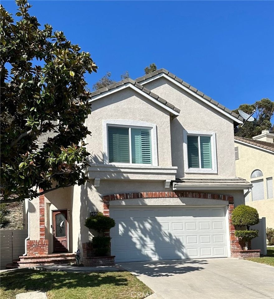 Beautiful Home features 4 bedrooms, 2 full baths and powder room downstairs. Newer kitchen, countertop, appliances, paint, carpet & flooring, windows and shutters.  This home is move-in ready!  No neighbor behind the house. Located in prime area of North Chino Hills. Very convenient to all shops and freeways. This location is very well known for its great schools.