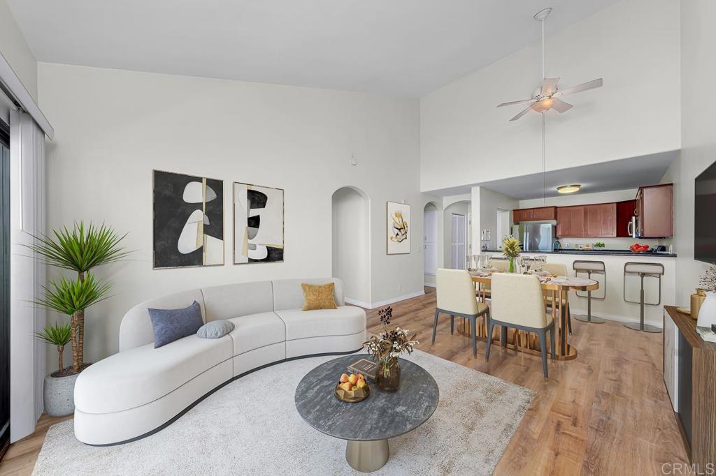 TOP-FLOOR WITH VAULTED CEILINGS. BALCONY. ELEVATOR. IN-UNIT LAUNDRY. NEW FLOORING & CARPET. NEW PAINT. NEW MINI-SPLIT AC. TWO ASSIGNED PARKING. GATED, POOL, & SPA. Welcome to 4540 60th Street #303, a refreshed top-floor 2-bed, 2-bath residence offering 845 sq ft of bright, comfortable living. The open living and dining area features soaring vaulted ceilings and flows to a private balcony for easy indoor–outdoor living with full, east mountain views. Fresh interior paint pairs with new flooring and carpet throughout, while central AC keeps things cool year-round. The split-bedroom layout includes an en-suite bedroom and great storage. Elevator access adds everyday convenience, and TWO assigned parking spaces complete the package. Community amenities include a pool and spa; the HOA covers water, trash, sewer, common-area utilities, exterior maintenance, management, and building upkeep. In San Diego’s College Area/El Cerrito, close to SDSU and the restaurants and coffee spots along El Cajon Blvd—with quick I-8 access at College Ave for easy commuting.