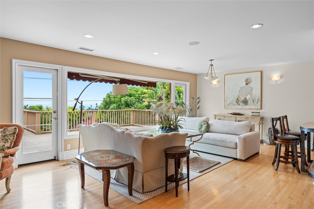 Dreaming of a spacious, ocean-view home in Lunada Bay? Look no further.
With over 3,000 square feet of beautifully updated living space, this exceptional home checks every box—expansive ocean and Queen’s Necklace views, a generous yard, and a flexible, open layout that lives like a single-level home.
The main floor welcomes you with a bright and airy living room featuring a cozy fireplace and panoramic views through a picture window. Step outside onto the large deck—perfect for entertaining or simply enjoying sunsets over the Pacific. The adjacent formal dining room connects seamlessly to a stylish kitchen with granite countertops and ample cabinetry.
The entry level also includes the luxurious primary suite with dual walk-in closets and a spa-inspired bathroom, plus an additional bedroom and full bath. Direct garage access adds everyday convenience.
Downstairs, a spacious family room with its own fireplace opens directly to the expansive, grassy backyard—ideal for gatherings, play, or quiet relaxation. You'll also find a large office (easily convertible to a fourth bedroom), another generous bedroom, and 1.5 bathrooms.
All this in one of Palos Verdes Estates’ most sought-after neighborhoods. Rarely does a home offer this much in such a prime location. Don’t miss this incredible opportunity!