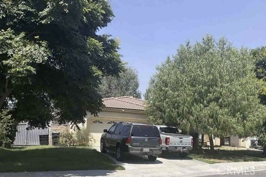 Nestled on a quiet East Hemet cul-de-sac, this move-in ready single-story home offers 3 bedrooms, 2 bathrooms, and an open layout with new wood-style flooring. Highlights include a spacious kitchen, cozy fireplace, and a private primary suite with patio access and a walk-in closet. Enjoy a large, entertainment-friendly backyard with a covered patio, gated RV parking, and two sheds—all with low taxes, no HOA, and a convenient location near schools, shopping, and dining.