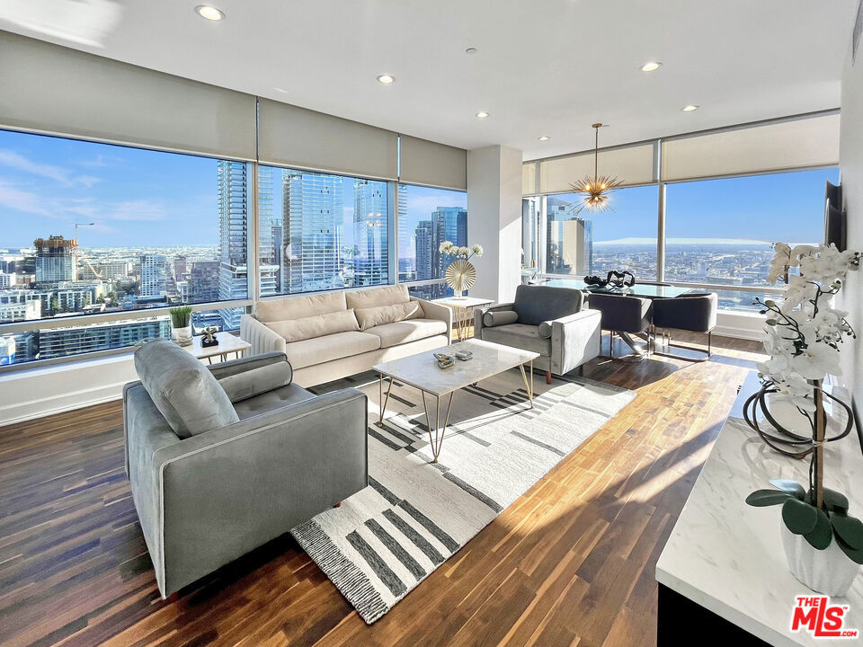 Impeccably Furnished is this Incredible Southeast Corner Condominium at the Very, Very Popular Ritz-Carlton Residences Los Angeles. Inventory is hard to come by at Ritz, especially 2 Bedrooms, and presented here we have a spectacular 2 Bedroom, 3 Bath on the 27th floor overlooking Crypto and LA Live. This is one of the more in demand locations in the building and you have extra wow factor with it being a corner unit. Residence 27A features a sleek black kitchen with an incredible primary suite overlooking the gorgeous Ritz Carlton Saltwater Pool area. Primary bathroom is truly spa-like with a large oversized tub and floor to ceiling stonework. In the living room, experience the fantastic views with walls of windows and for the building itself, treat yourself to the 5 Star Lifestyle that Ritz is so famous for. This building is very popular for a reason. There is guest and valet parking, 24 hour security, conference and screening rooms, on site Ritz Spa, gym, saltwater pool, bar and cabanas, and the popular 24 Sky Lounge at The Marriott. An exciting and luxurious place to live. Furnishings are exquisite. 2 valet parking. Renters insurance required. Excellent credit, financials, tenant history and references are a must. Min 1 Year Lease. Furnished Only. No smoking is allowed.