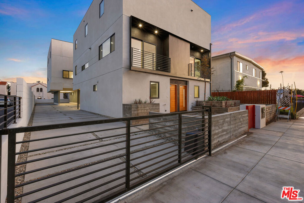 DO NOT CALL THE OWNER. THE PROPERTY WILL BE RE LISTED SOON!Fully Leased & Non-Rent controlled property with OVER 5.5% Cap Rate! This quadplex was built in 2022 with exceptional standards across design and amenities. Each townhome is a modern architectural masterpiece, promising luxury living in a green-certified environment. All four units have three level living space and an open plan layouts incorporate striking walls of windows, bespoke finishes and natural wide plank wood flooring. The two building townhomes begin with a 1950 sq ft six bedroom, four bath home with two primary suites. A 1,828 sq ft unit hosts five bedrooms and five baths offering three en suite bedrooms and two primary suites. At 1,804 sq ft, unit three features four bedrooms and four baths including two primary suites plus a 1,770 sq ft four bedroom, four bath home with three primary suites. All units have custom cabinetry, quartz counters, gas range and custom tiles and sophisticated finishes in the bathrooms. Among the integrated systems are tankless water heaters, solar energy and central heat and air. Each unit provides two parking spaces while services include separate utility meters with dedicated exterior electric and irrigation systems. West Adams is very central and within close proximities to Downtown LA, Freeway, West LA, Culver City and USC. Don't miss out on this rare property!