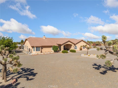 Photo of 11025 El Esteban RD, Phelan, CA 92371 (MLS # HD26099066)