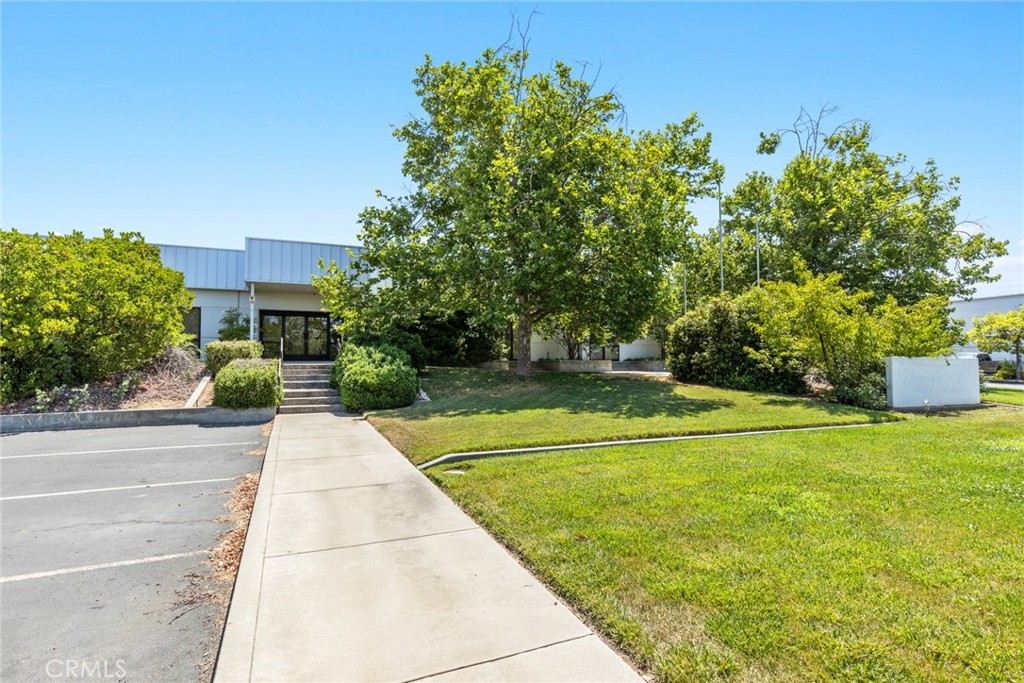 This 6,000± SF office building presents a professional, well-maintained exterior with prominent building signage and monument signage along Cohasset Road. The interior layout is thoughtfully designed to support a range of business operations and includes eight private offices, two conference rooms, a spacious open work area, reception and waiting area, break room, private restrooms, and dedicated IT room with rack and mini-split HVAC. Additional highlights include high-speed fiber optic internet, keyless entry for enhanced security, fire sprinkler system, and a large outdoor patio ideal for breaks or team gatherings. Ample on-site parking ensures convenience for both employees and visitors. A quality office environment offering function and comfort.